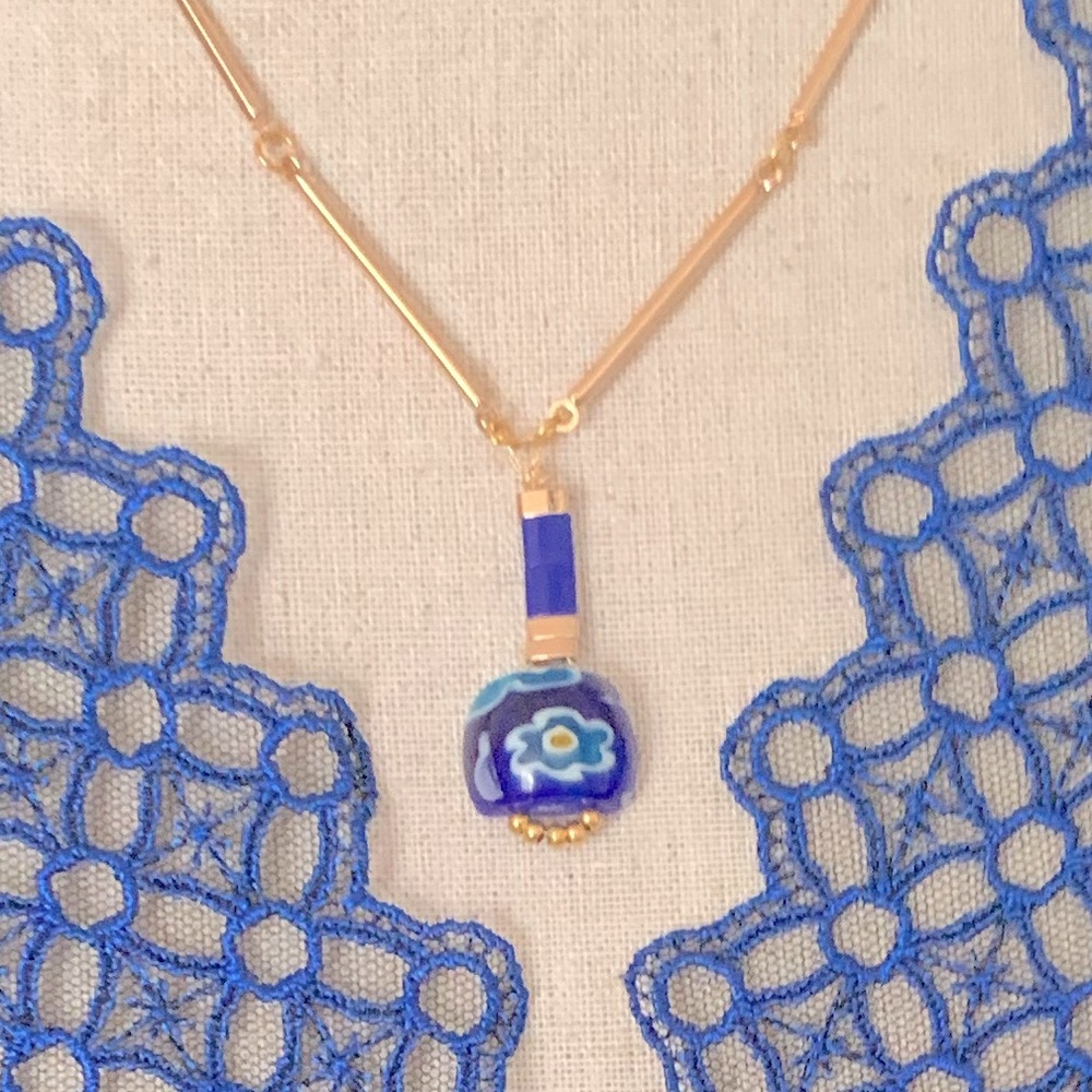 Necklace With Blue Pendant And Gold Colour Chain